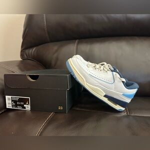 Jordan white and university blue Sneakers. Size 5